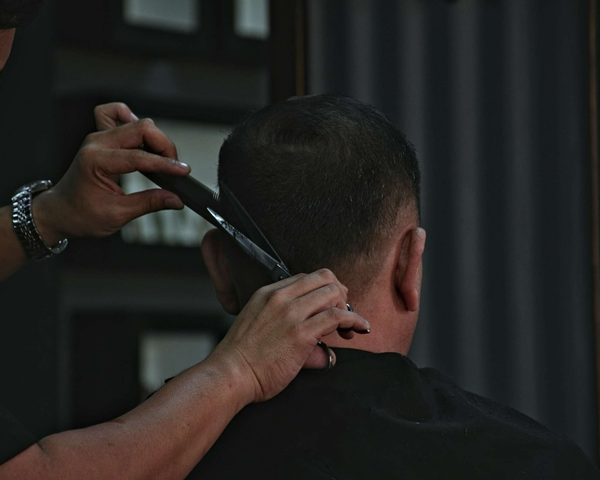 Man getting his skin fade haircut